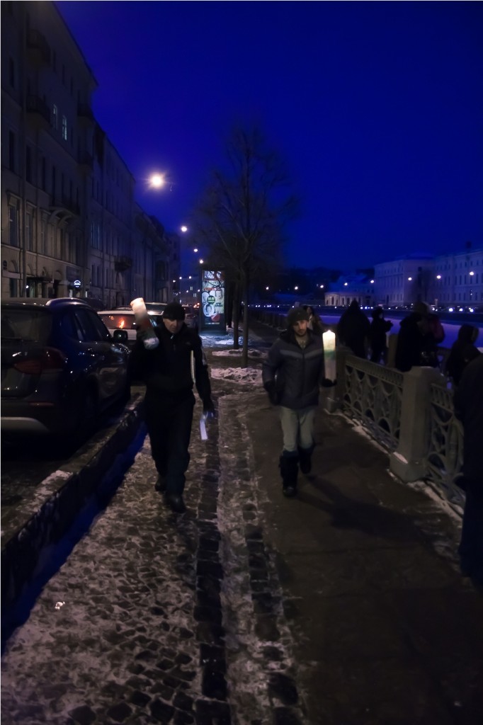 By-Evgenia-Bolshakova_Sacha-and-Micha-bring-the-iced-candles-on-the-Anichkov-bridge_11-02-2012.jpg